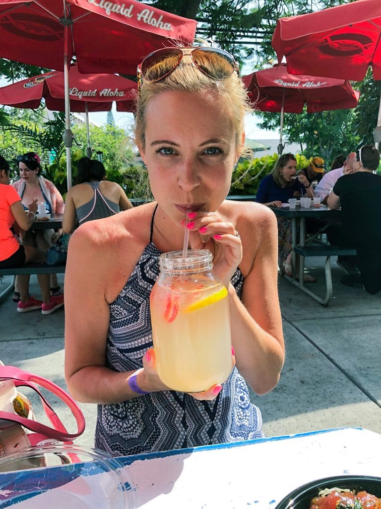 Sues drinking strawberry lemonade while sitting outside at Umeke's in Kona on the Big Island of Hawaii