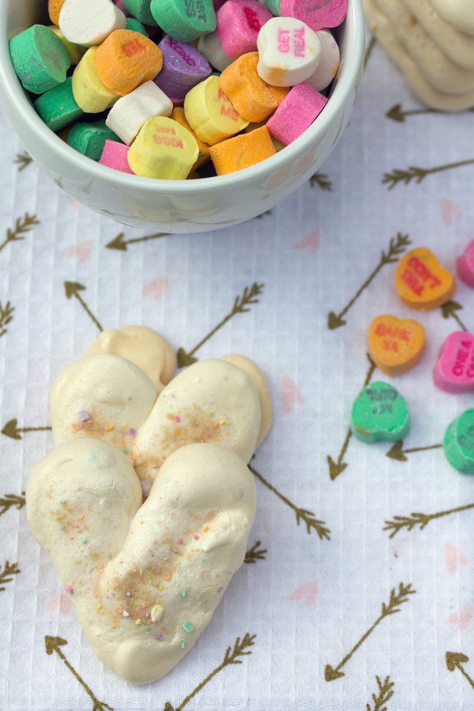 Valentine's Day Heart Meringues -- Incorporate conversation hearts into this sweet treat | wearenotmartha.com