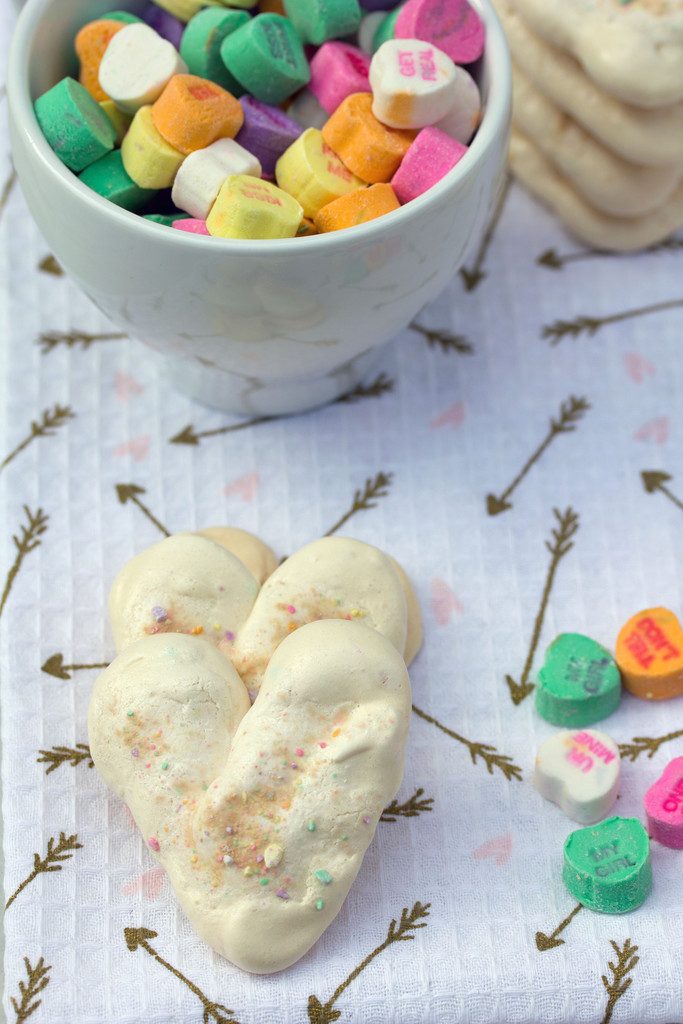 Valentine's Day Heart Meringues -- Incorporate conversation hearts into this sweet treat | wearenotmartha.com