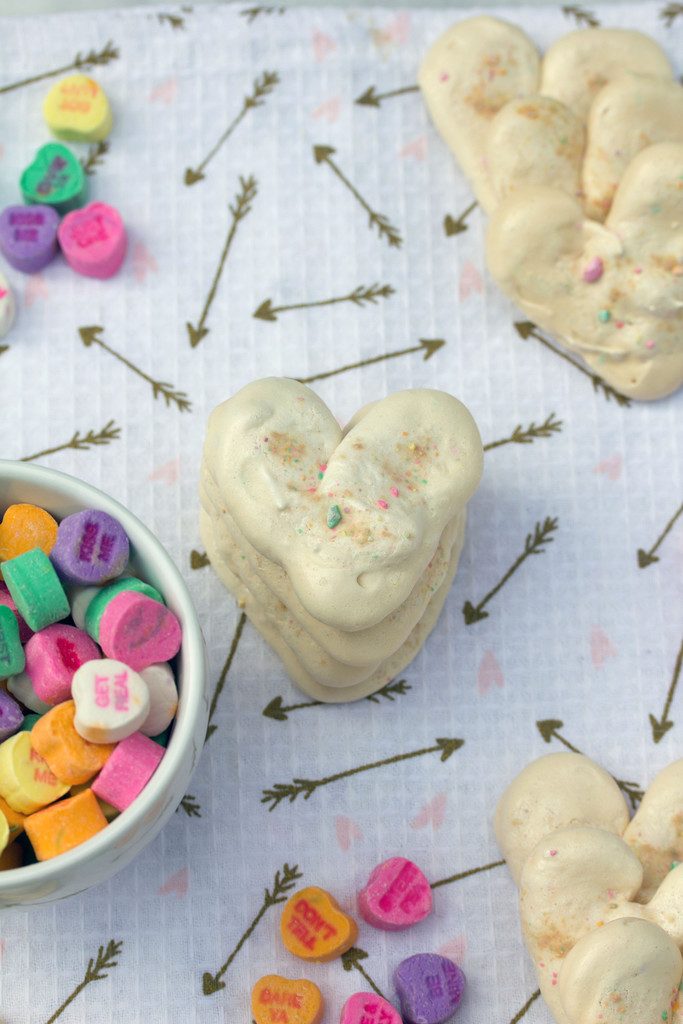 Valentine's Day Heart Meringues -- Incorporate conversation hearts into this sweet treat | wearenotmartha.com