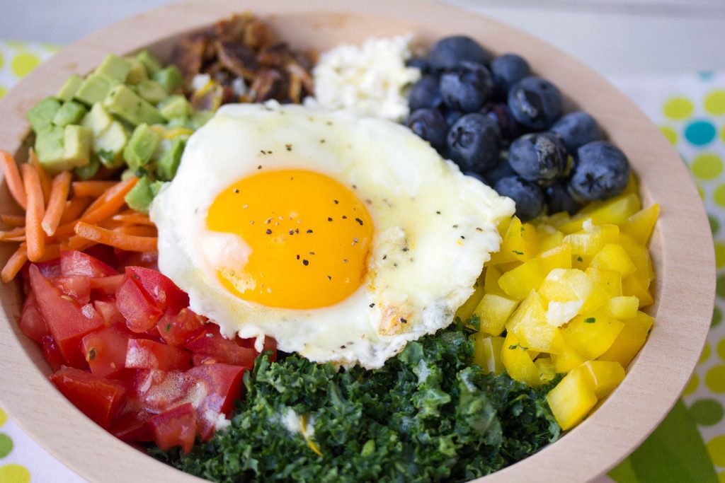 Veggie Breakfast Bowl -- A rainbow of vegetables topped with an egg | wearenotmartha.com