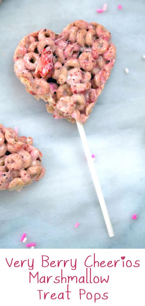Very Berry Cheerios Marshmallow Treat Pops -- These Very Berry Cheerios Marshmallow Treat Pops are heart-shaped Rice Krispies treats style pops perfect for Valentine's Day or any time you want to show your love! | wearenotmartha.com