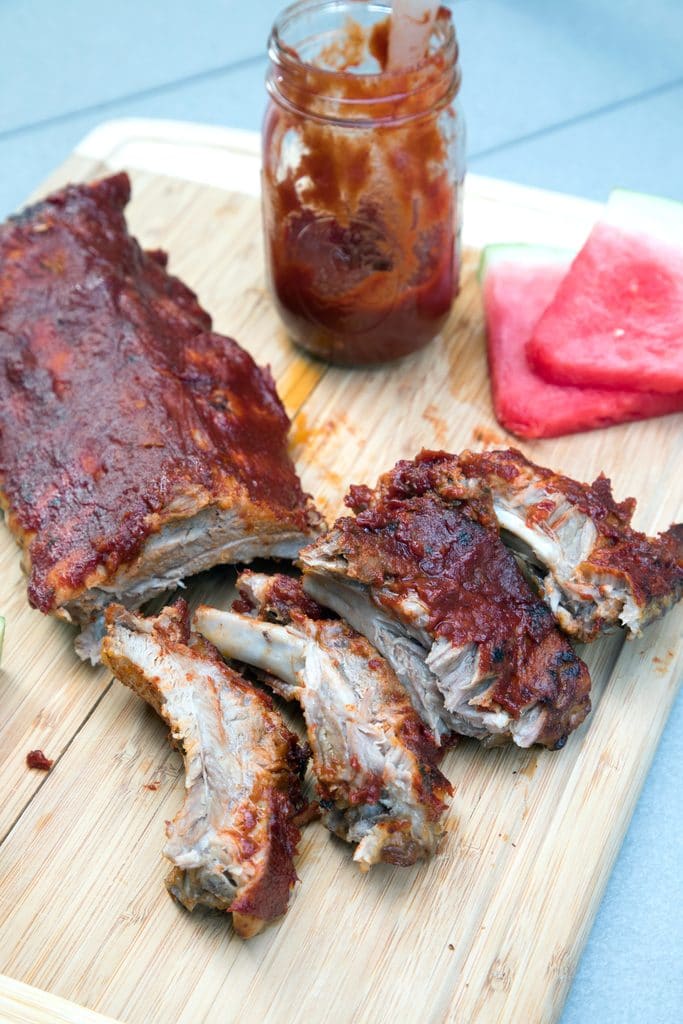 Watermelon Beer Baby Back Ribs in the Instant Pot -- Cooking them in the Instant Pot is the only way to make baby back ribs made with watermelon beer and slathered in watermelon BBQ sauce even better! | wearenotmartha.com