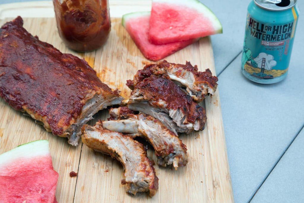 Watermelon Beer Baby Back Ribs in the Instant Pot -- Cooking them in the Instant Pot is the only way to make baby back ribs made with watermelon beer and slathered in watermelon BBQ sauce even better! | wearenotmartha.com