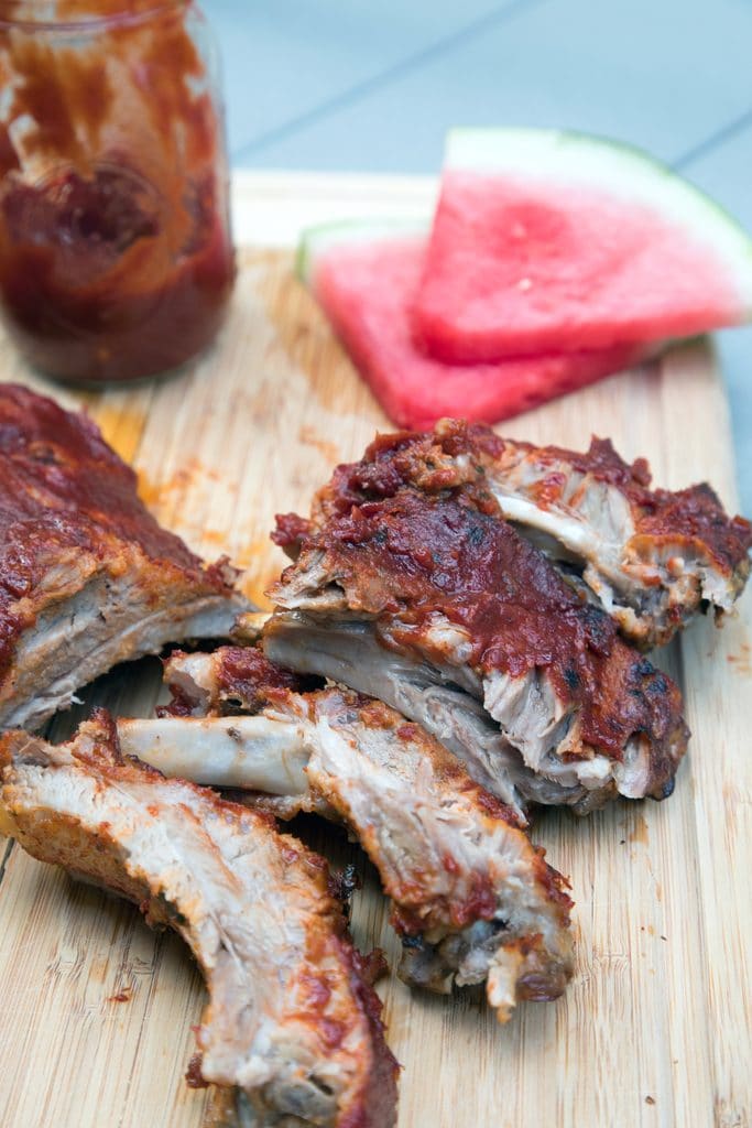 Watermelon Beer Baby Back Ribs in the Instant Pot -- Cooking them in the Instant Pot is the only way to make baby back ribs made with watermelon beer and slathered in watermelon BBQ sauce even better! | wearenotmartha.com