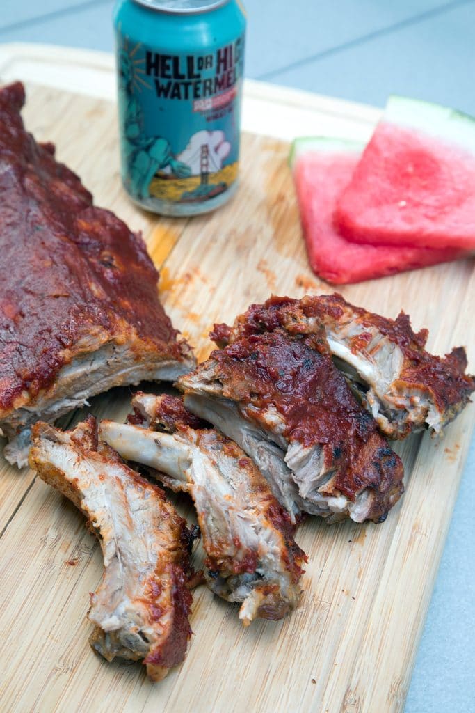 Watermelon Beer Baby Back Ribs in the Instant Pot -- Cooking them in the Instant Pot is the only way to make baby back ribs made with watermelon beer and slathered in watermelon BBQ sauce even better! | wearenotmartha.com