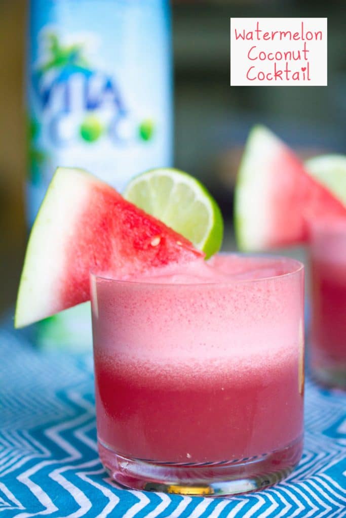 Head-on view of watermelon coconut cocktail with watermelon wedge and lime garnish and carton of coconut water in the background with recipe title at top