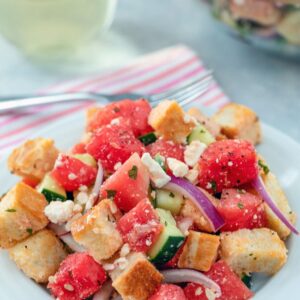 Watermelon Panzanella -- This may not be a traditional panzanella salad, but Watermelon Panzanella Salad is packed with fresh summer ingredients (along with some carbs and cheese, of course) and is the perfect summer side dish | wearenotmartha.com