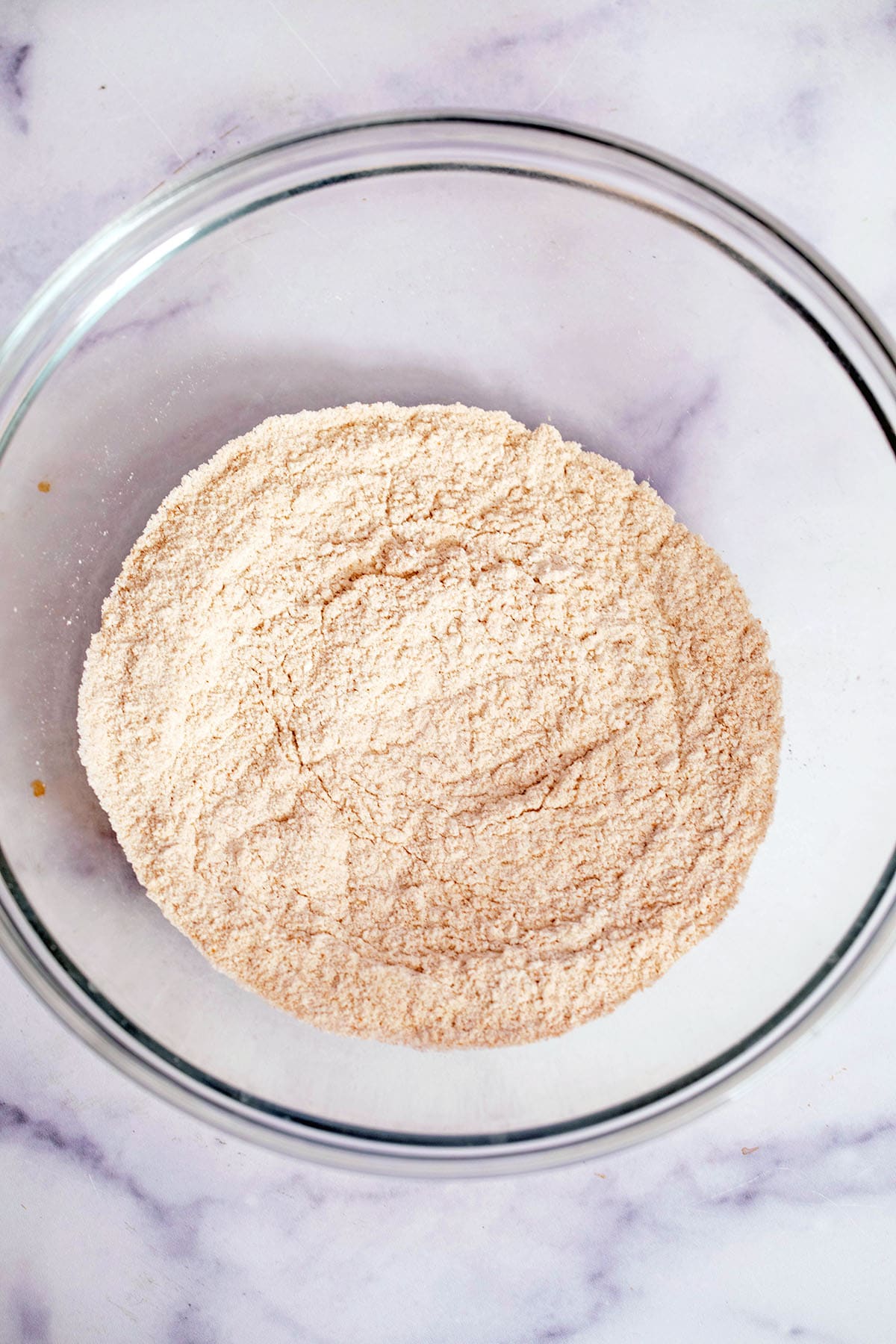 All-purpose flour and whole wheat flour in mixing bowl.