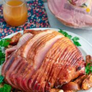 Apple Spice Glazed Ham with Baked Apples -- This Apple Spice Glazed Ham with Baked Apples is perfect for serving to your holiday crowd, but you also might not be to resist it for your family on random weeknight｜wearenotmartha.com