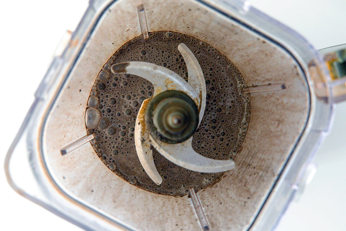 Landscape overhead view of Black Cat Frappuccino mixture in blender.