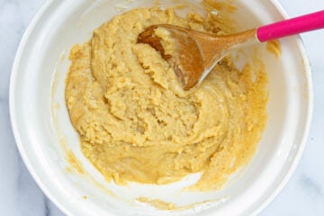 Shortbread crust mixture in mixing bowl.