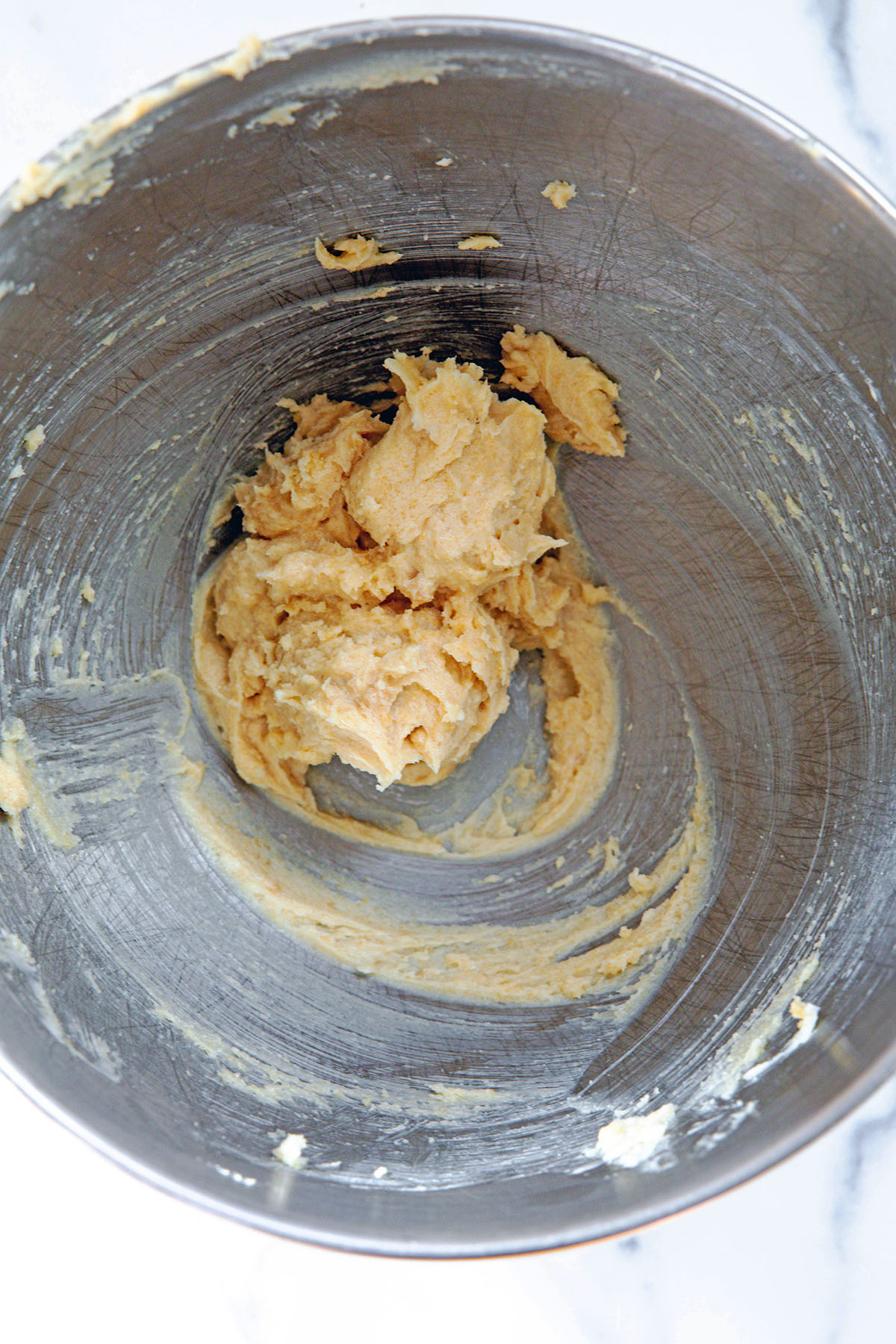 Butter and brown sugar creamed together in mixing bowl.