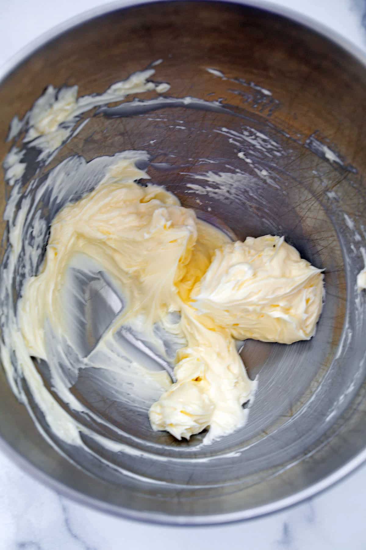 Butter and sugar creamed together in mixing bowl.