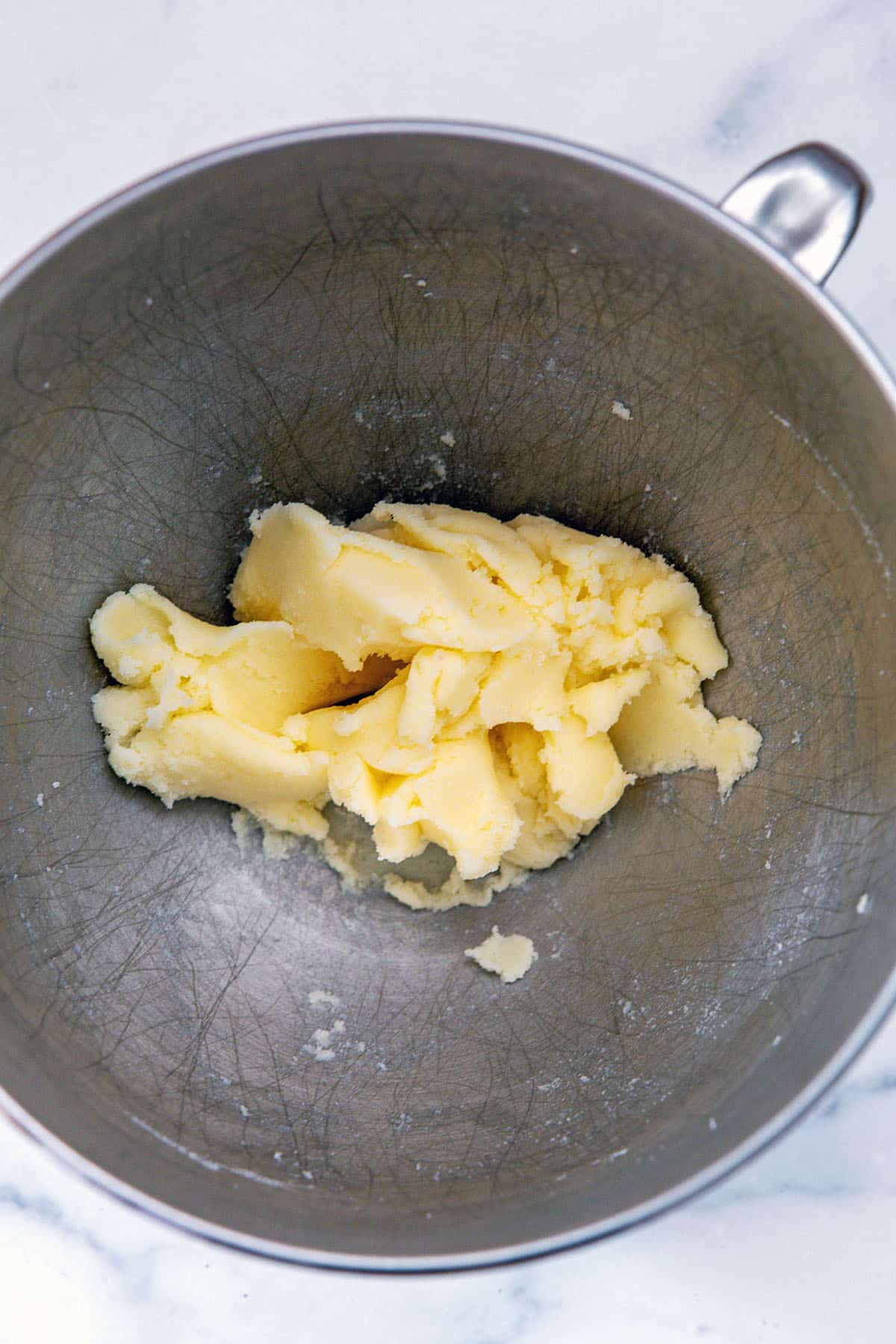 Butter and sugar creamed together in mixing bowl