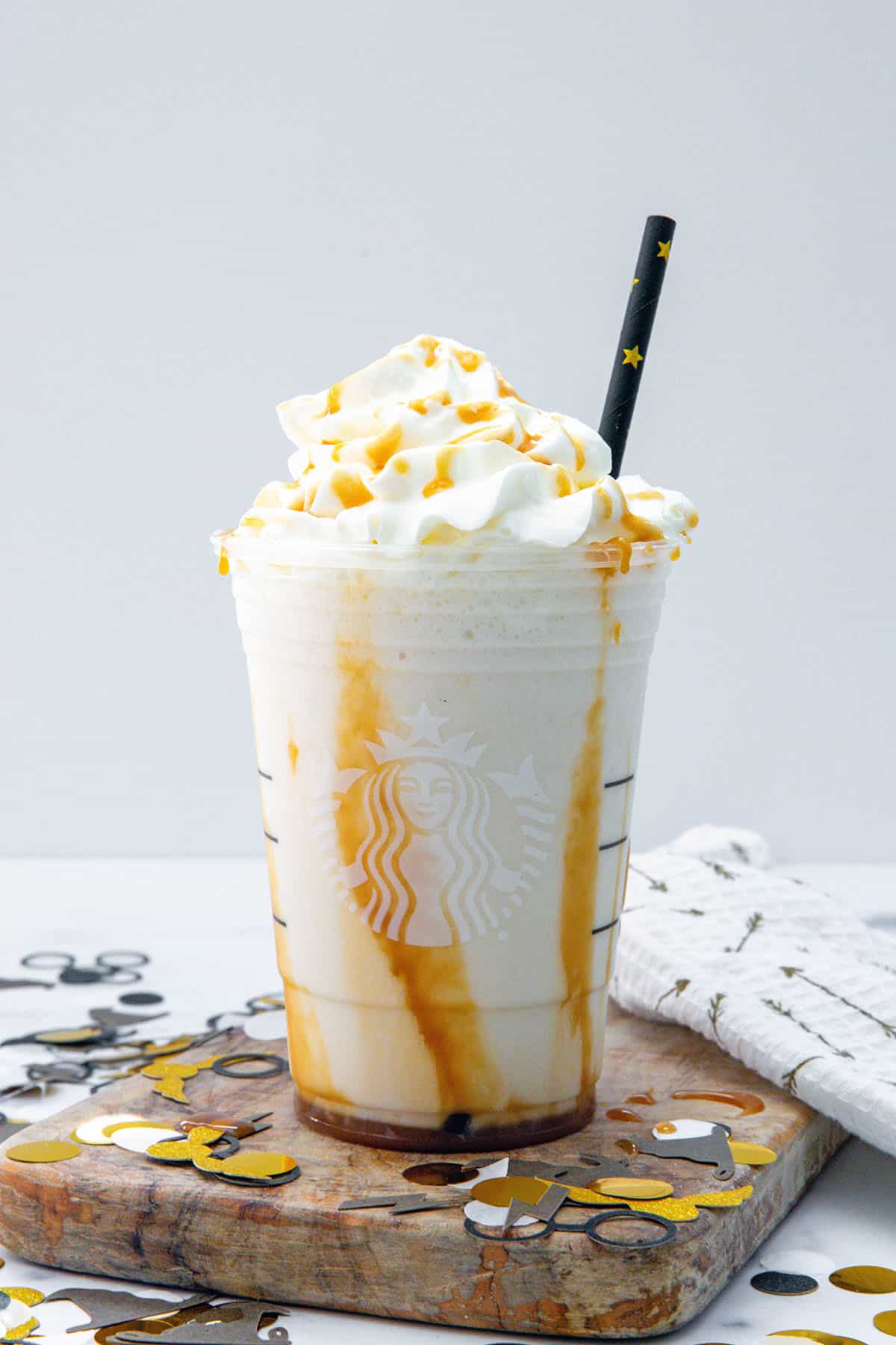 Head-on view of Butterbeer Frappuccino in Starbucks cup.