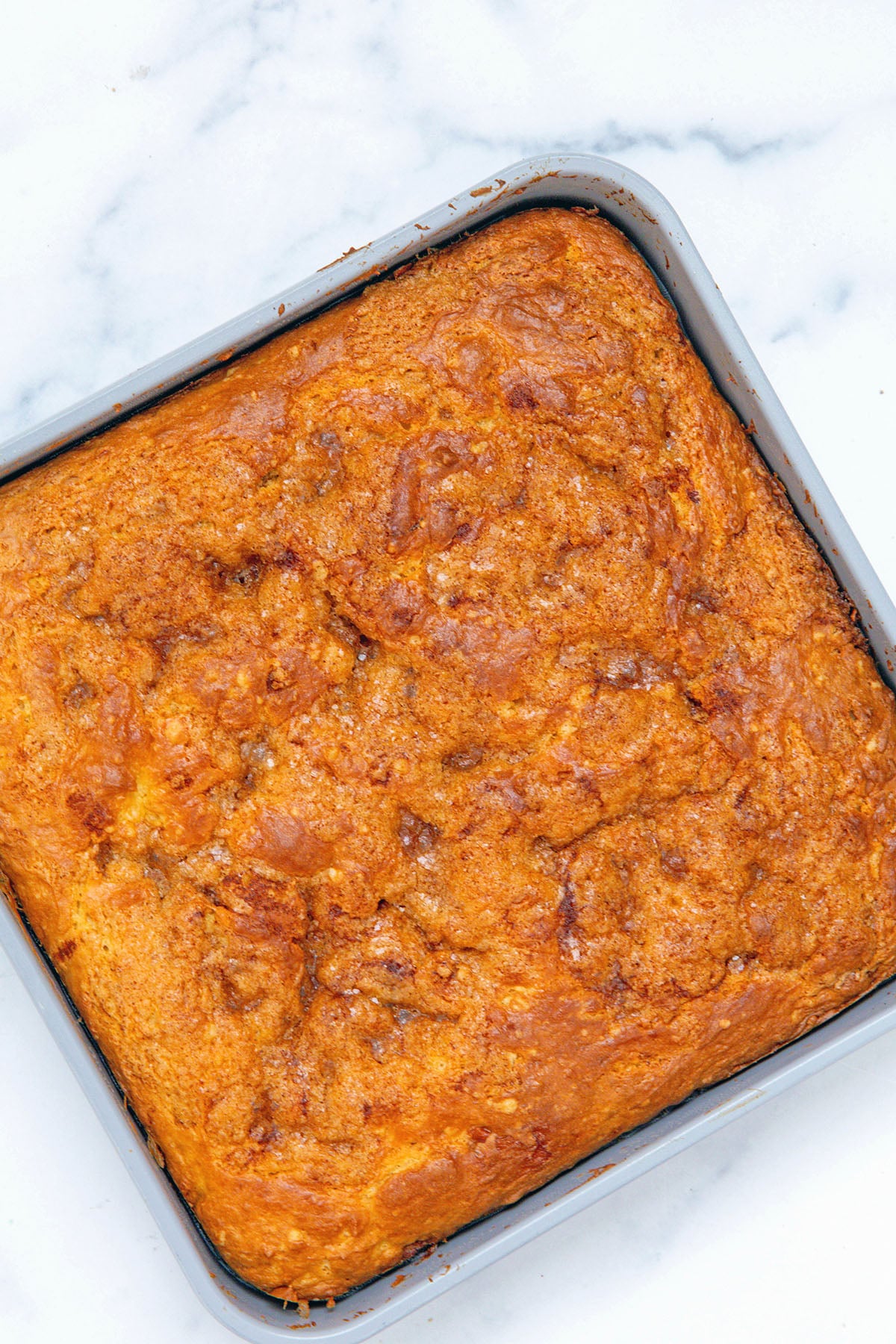 Cake mix coffee cake baked in square tin.