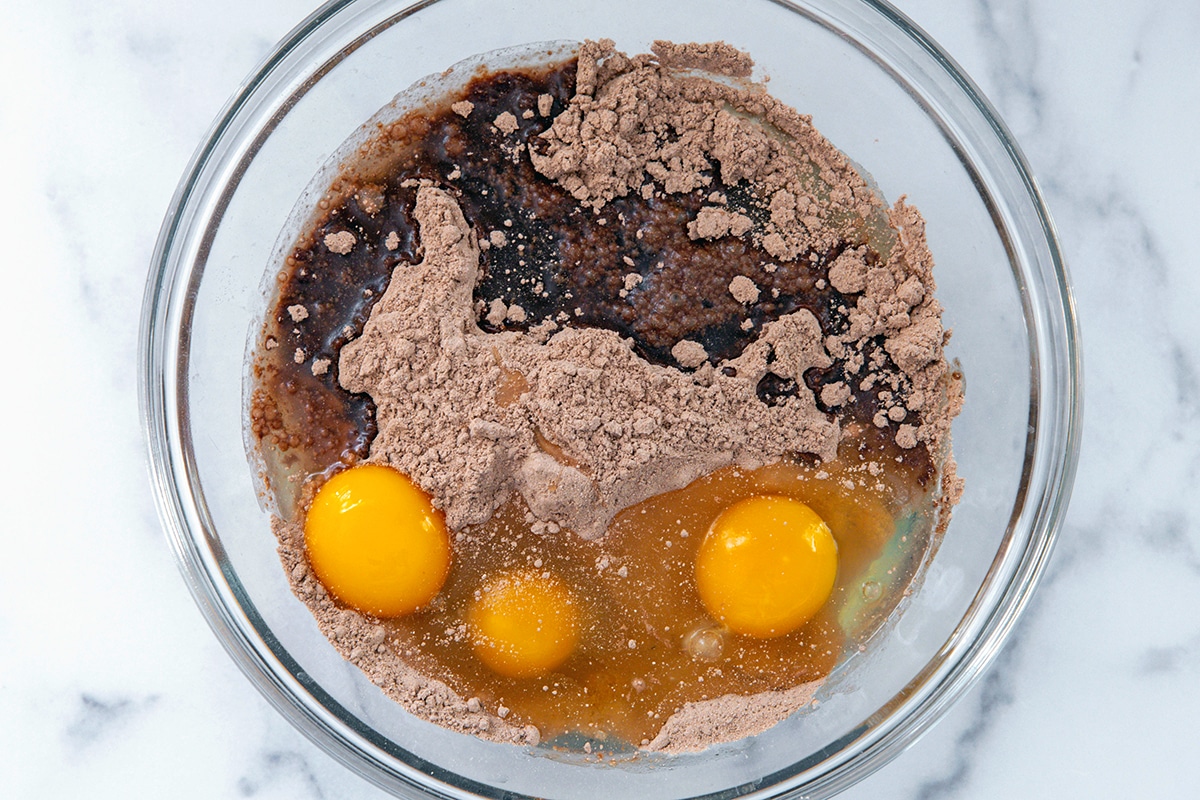 Cake mix, eggs, and vegetable oil in mixing bowl.