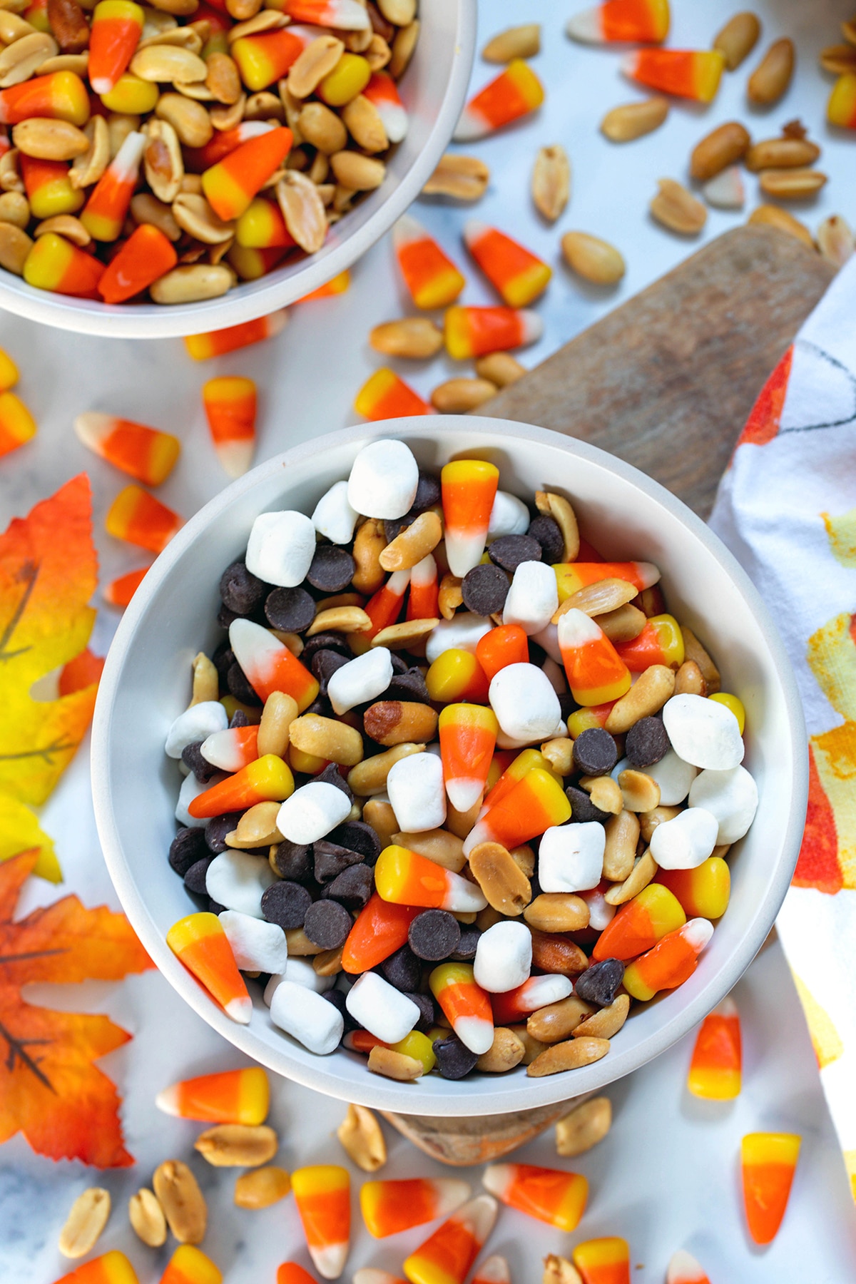 Candy corn and peanuts mixed with chocolate chips and mini marshmallows.