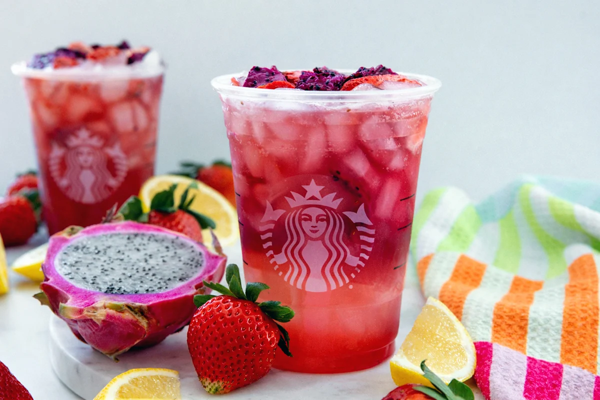 Landscape head-on view of a Cannon Ball Drink in a Starbucks cup.