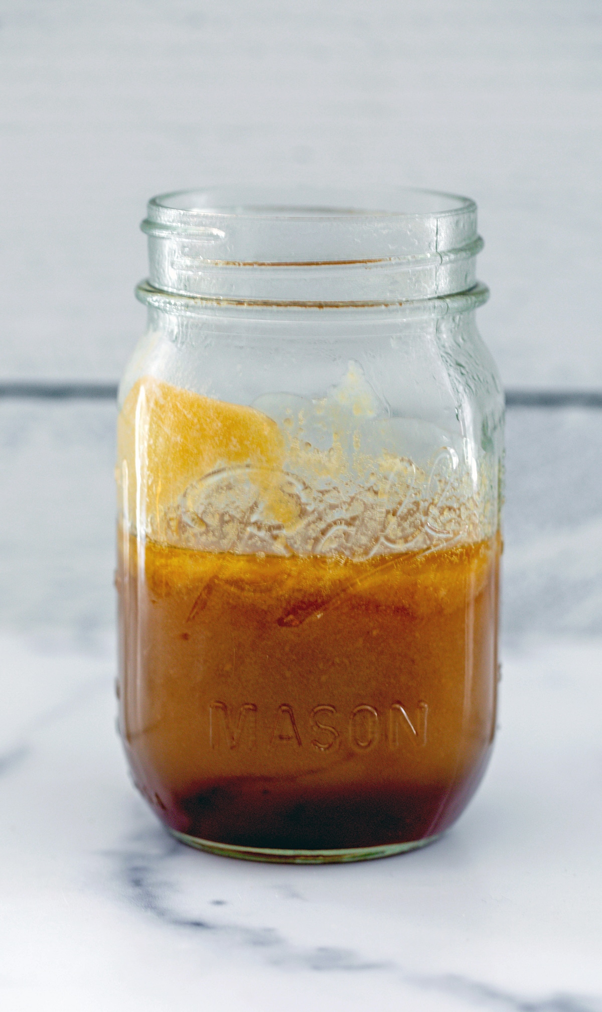 Caramel sauce in mason jar.