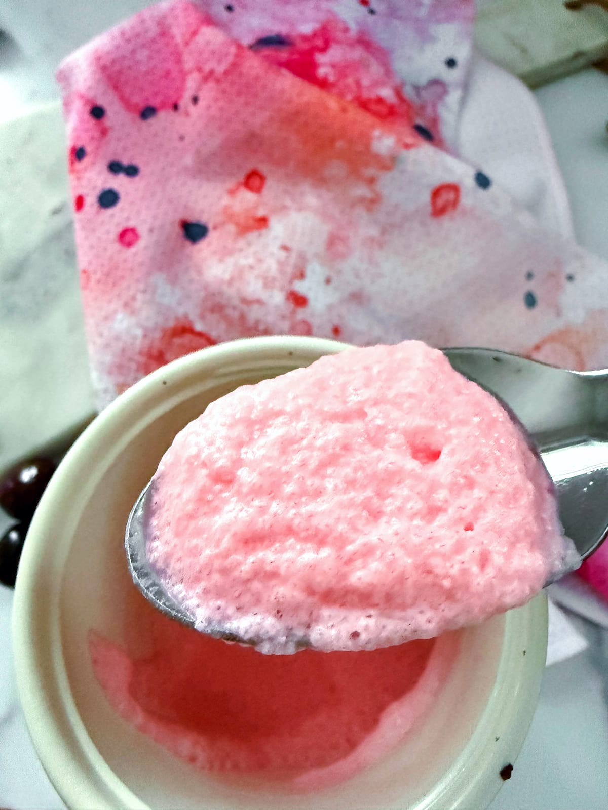 Cherry cold foam in electric frother.