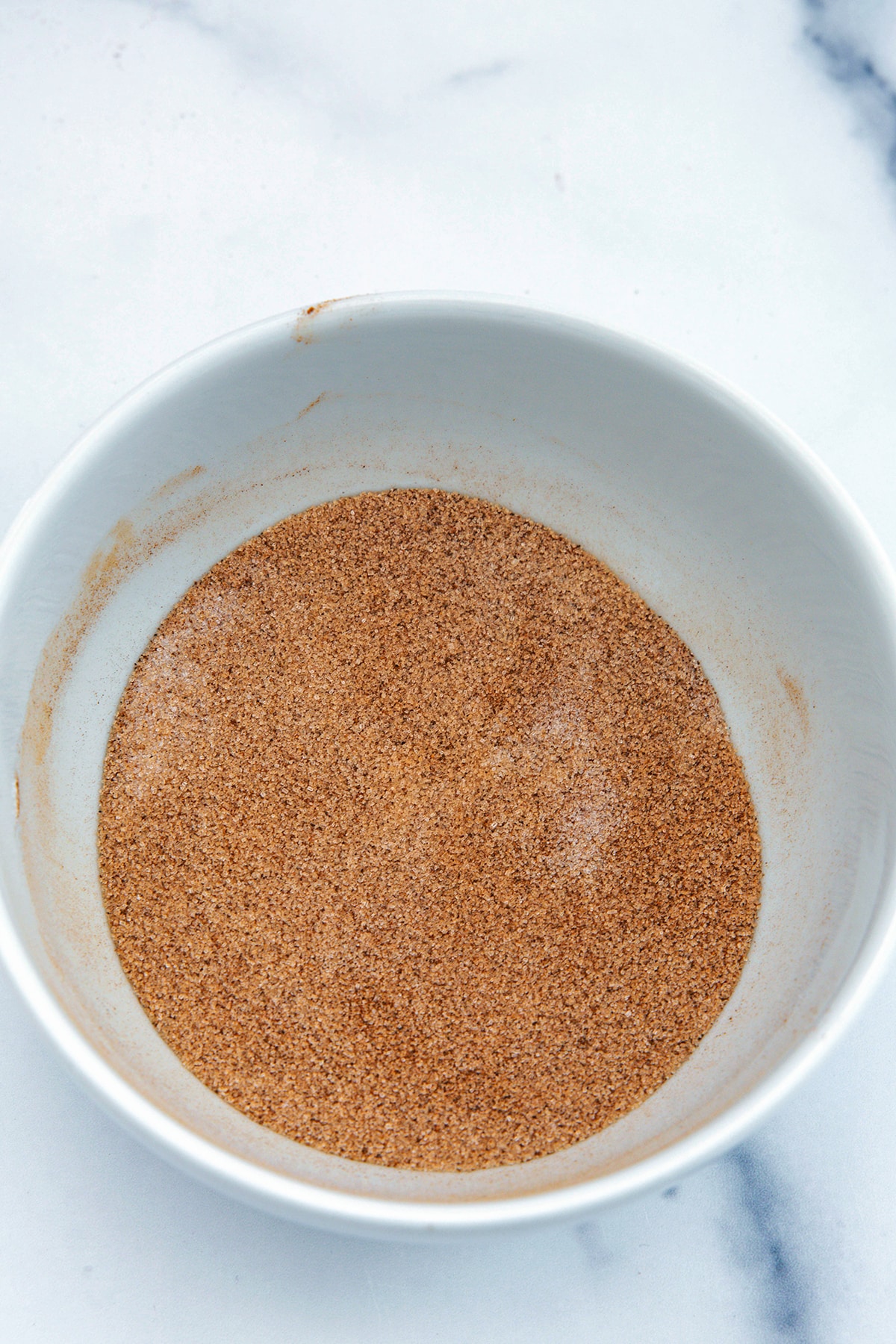 Cinnamon sugar mixture in bowl.