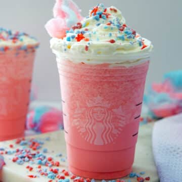 Closeup view of a Cotton Candy Frappuccino in a Starbucks cup.
