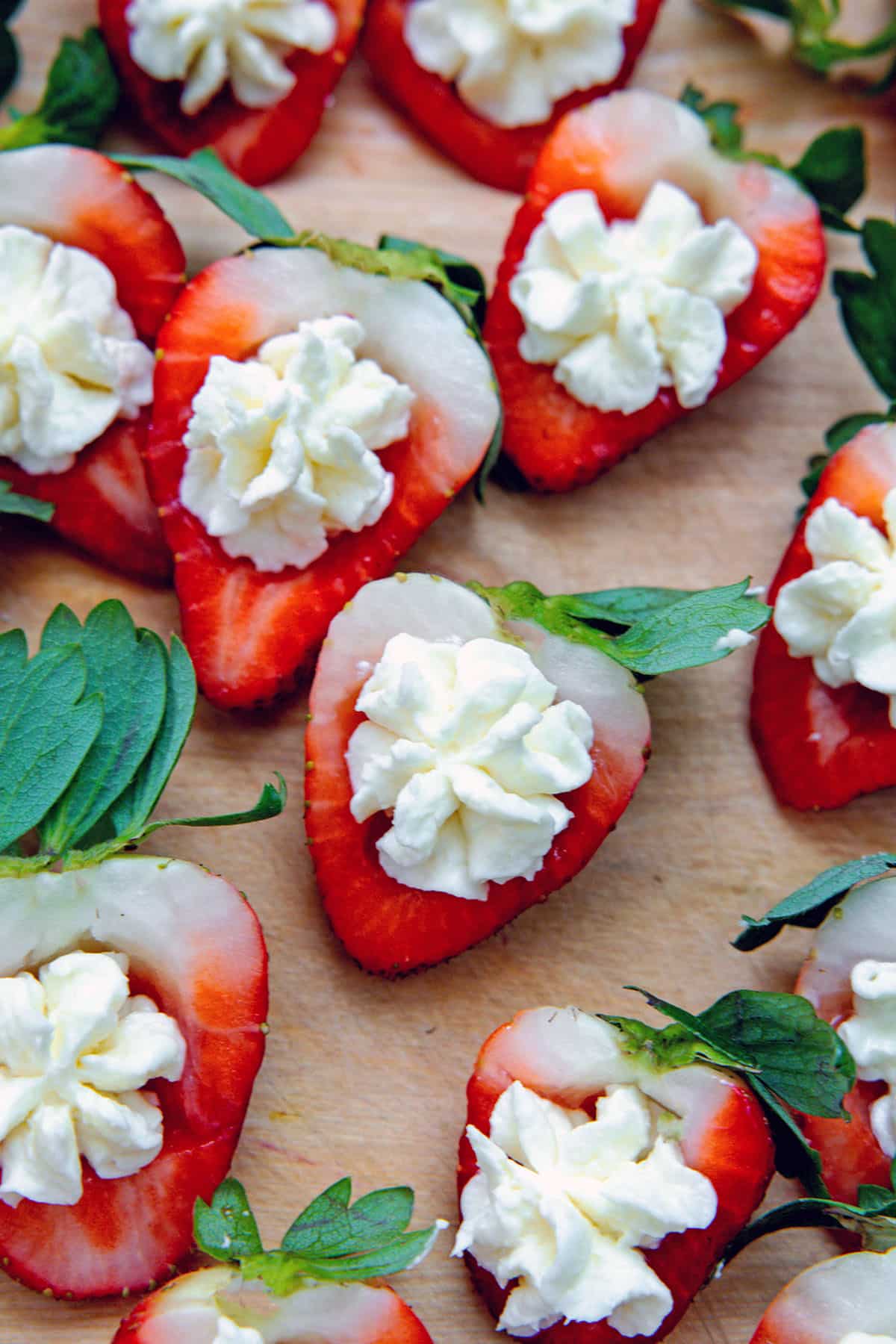 Sweet cream cheese filled strawberries.
