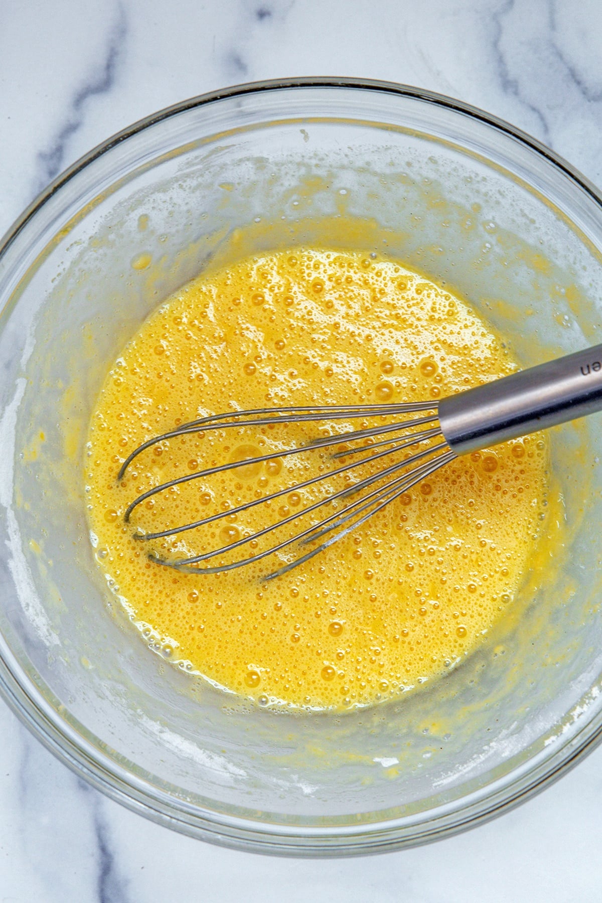 Eggs whisked together with sugar and spices.