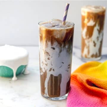 Head-on closeup view of a fluffy seagull coffee drink.