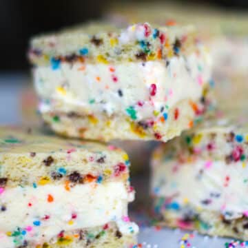 Closeup view of funfetti ice cream sandwiches stacked.
