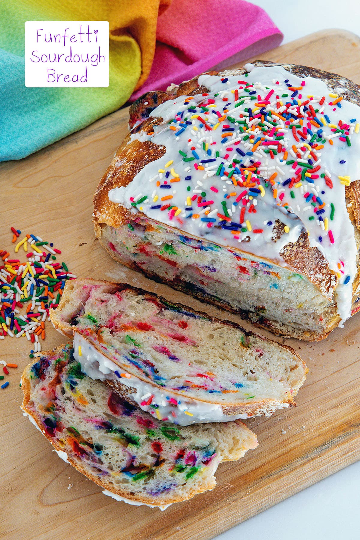 Slices of funfetti sourdough bread cut from loaf with sprinkles in background and recipe title at top.