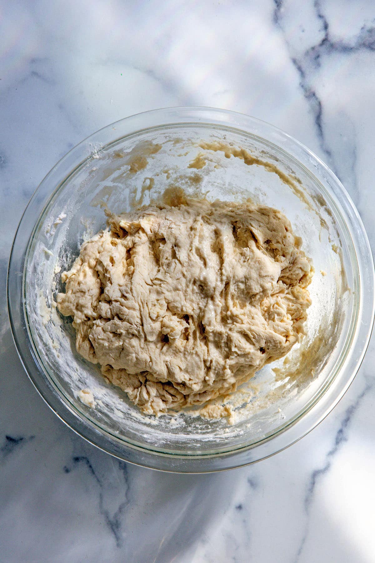 Dough just formed in bowl.