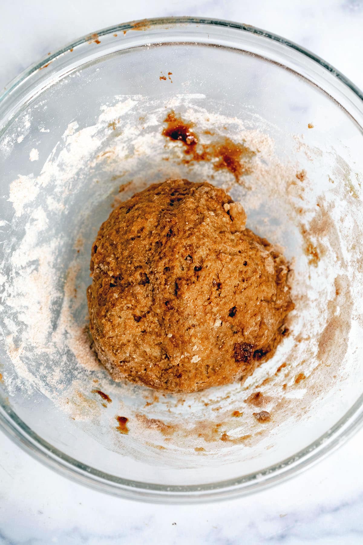 Gingerbread cookie dough in a mixing bowl.