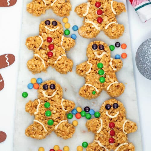 Gingerbread men Rice Krispies treats with mini M&M decorations.