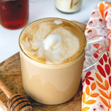 Closeup view of a Honey Almondmilk Flat White with foam.