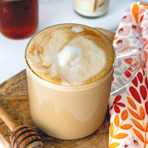Closeup view of a Honey Almondmilk Flat White with foam.
