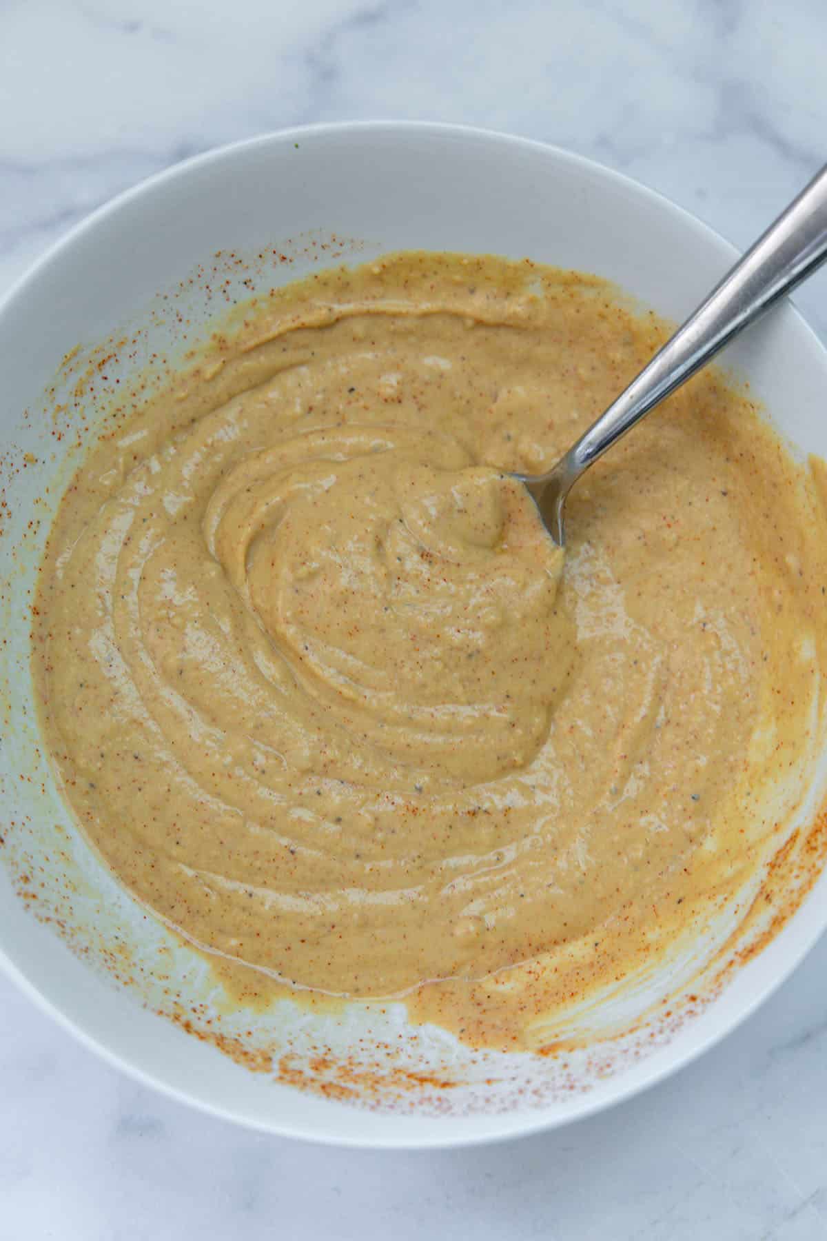 Hummus pasta sauce in bowl.