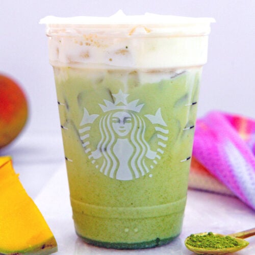 Closeup head-on view of an Iced Mango Cream Matcha.