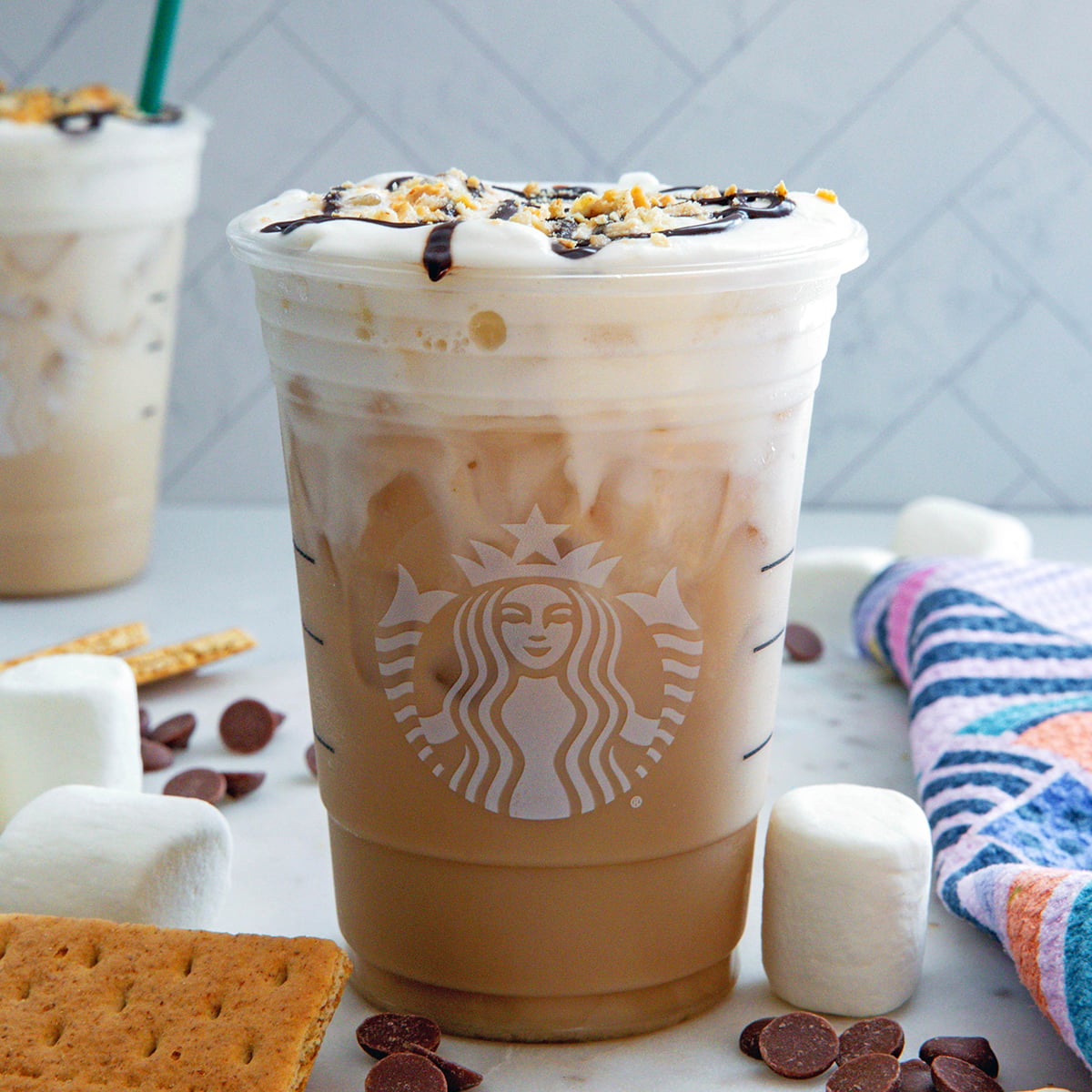 Closeup view of an Iced S'mores Chai in a Starbucks cup.