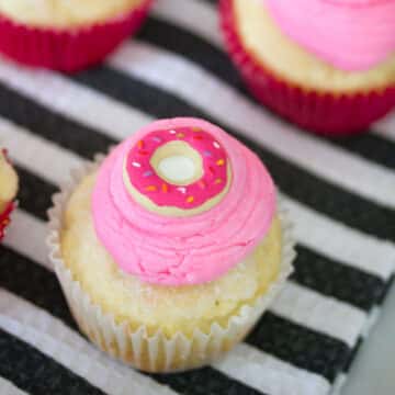 Closeup view of a jelly donut cupcake.