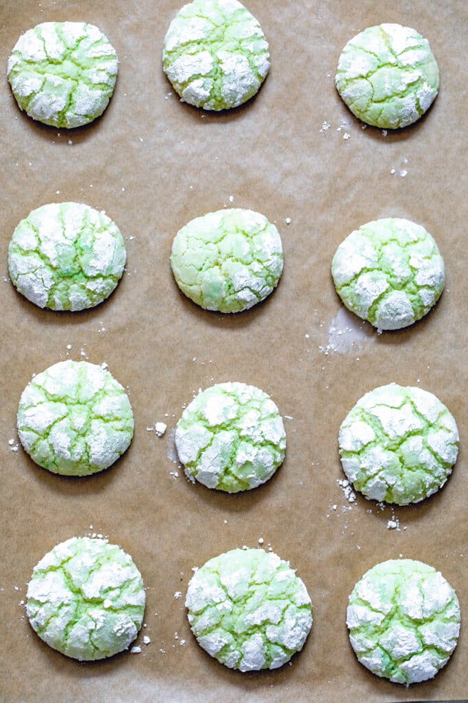 Key lime cookies baked and on cookie sheet.