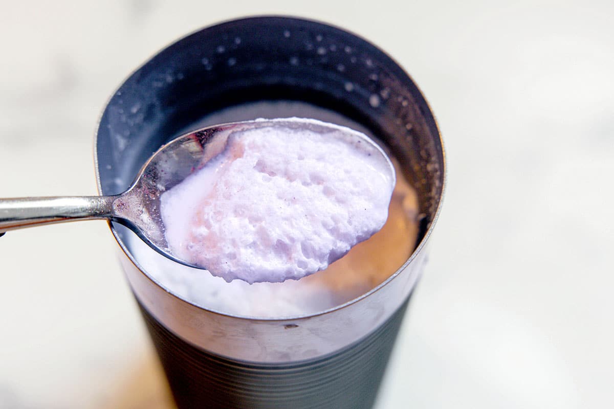 Lavender cold foam on a spoon.