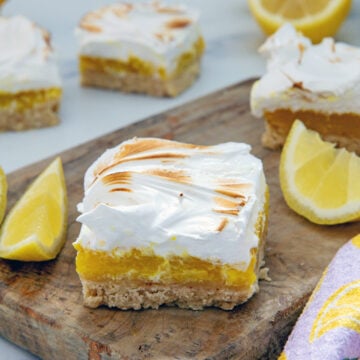 Closeup view of a lemon. meringue bar with toasted meringue topping.