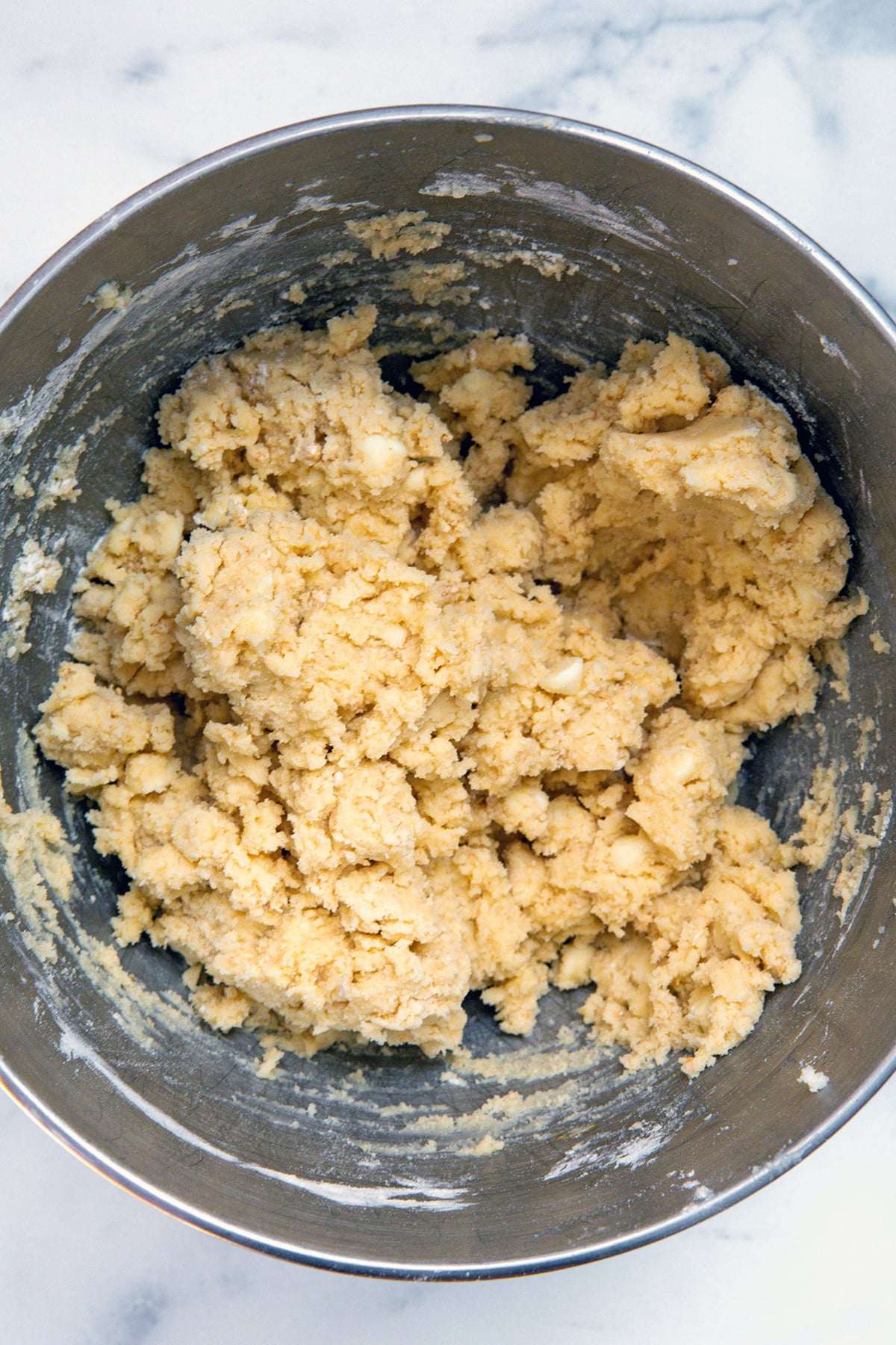 Lucky charms cookie cookie dough in mixing bowl.