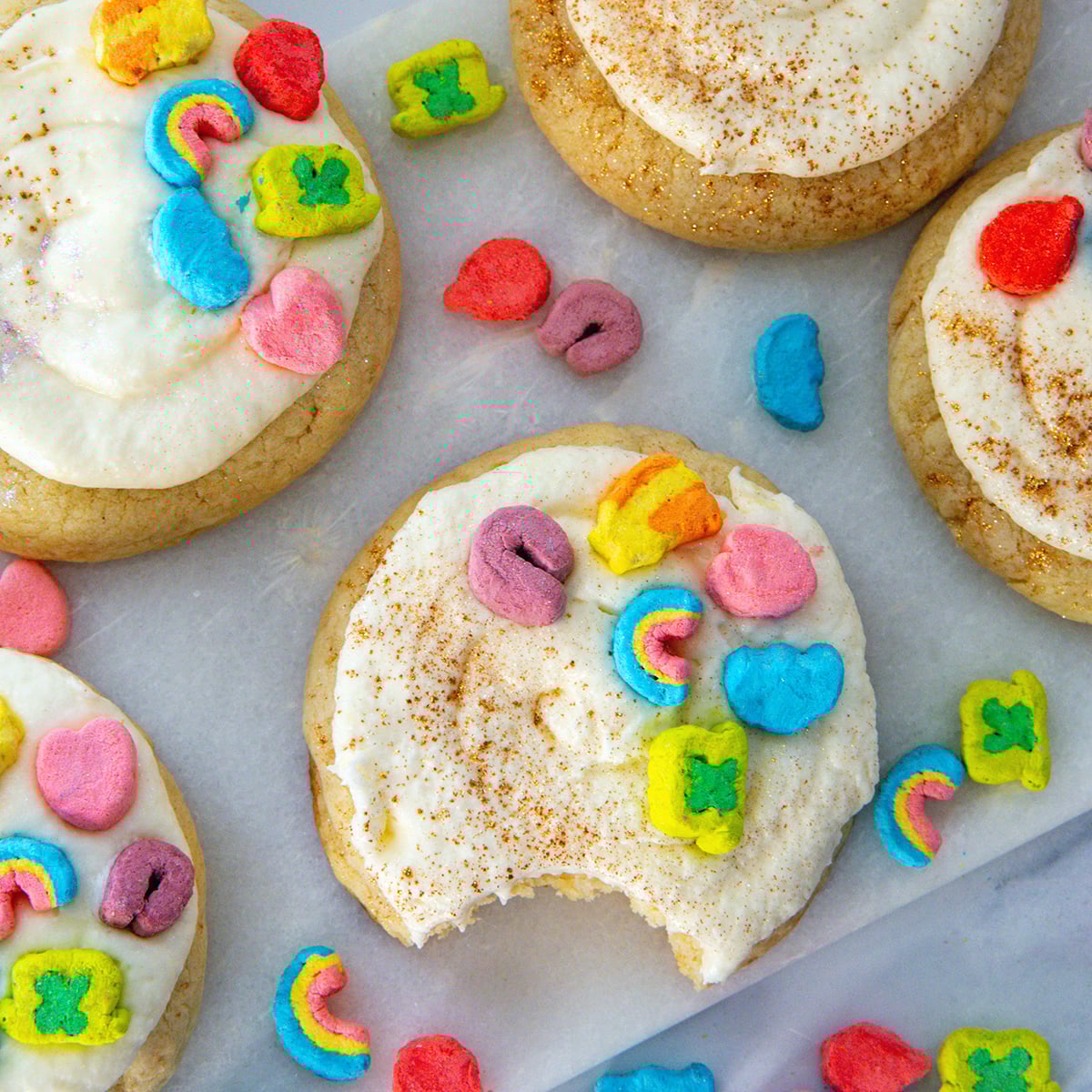 Closeup view of frosted Lucky Charms cookies.