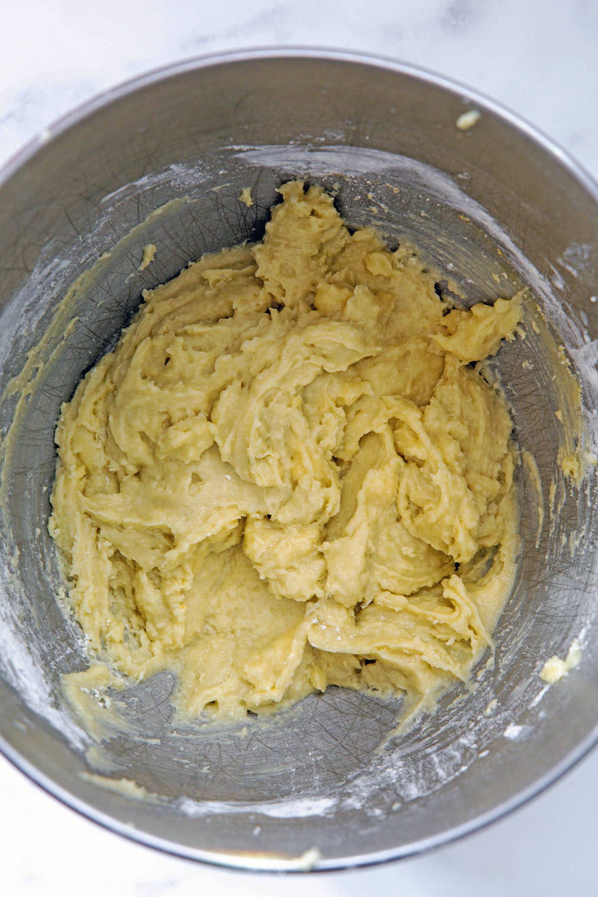 Lucky Charms cupcake batter in mixing bowl.