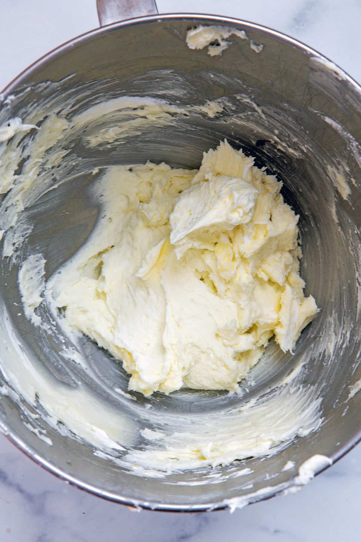 Marshmallow buttercream frosting in a mixing bowl.