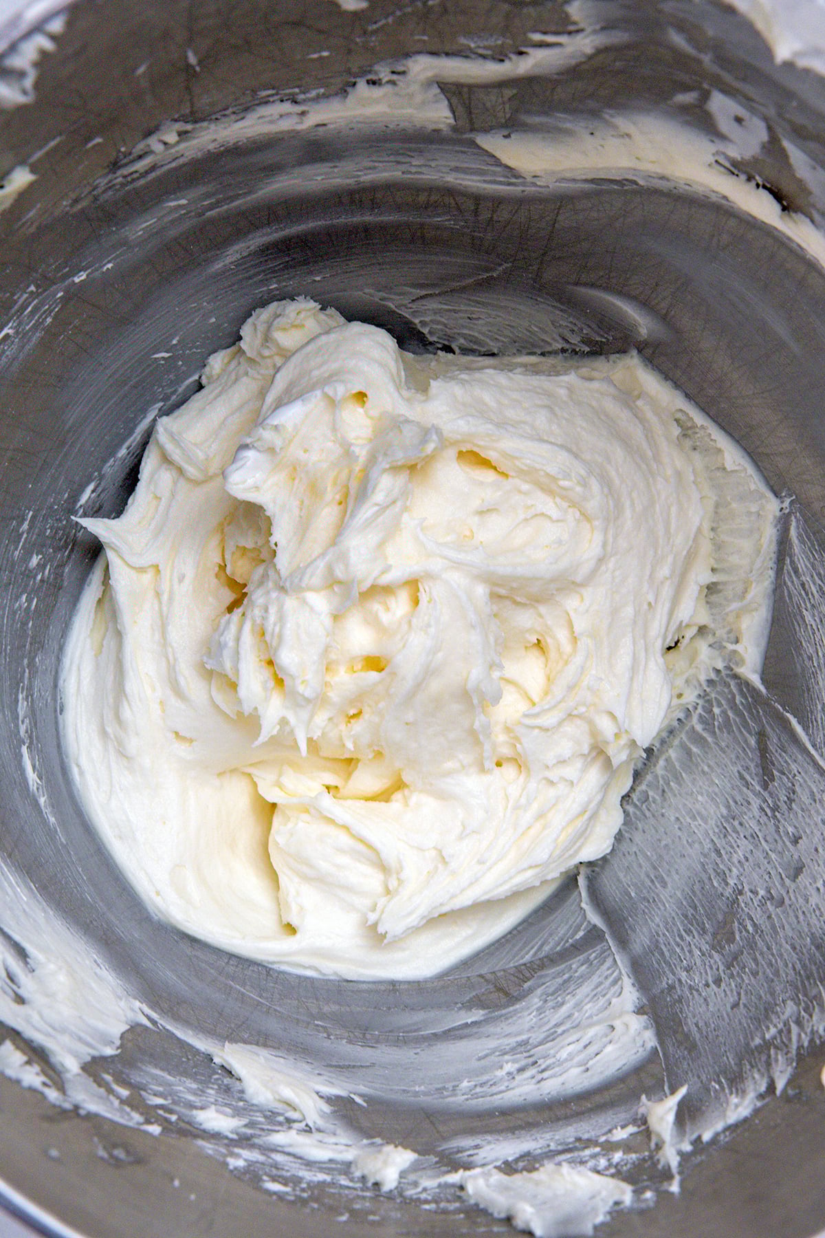Marshmallow frosting in mixing bowl.